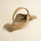 Interior lining and pockets of Tan tan fringe clutch bag