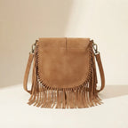 Back panel of Light Brown tan fringe crossbody bag with strap attachments