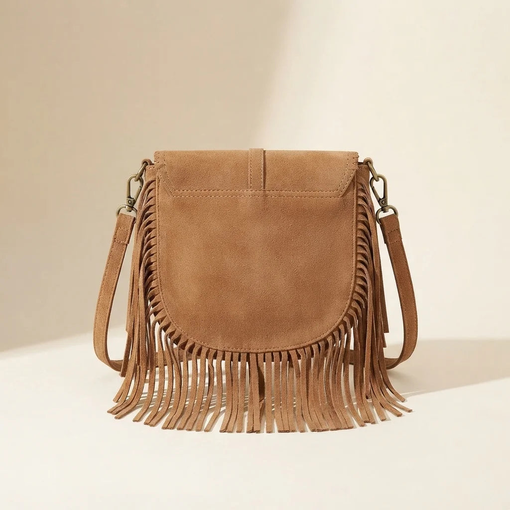 Back panel of Light Brown tan fringe crossbody bag with strap attachments
