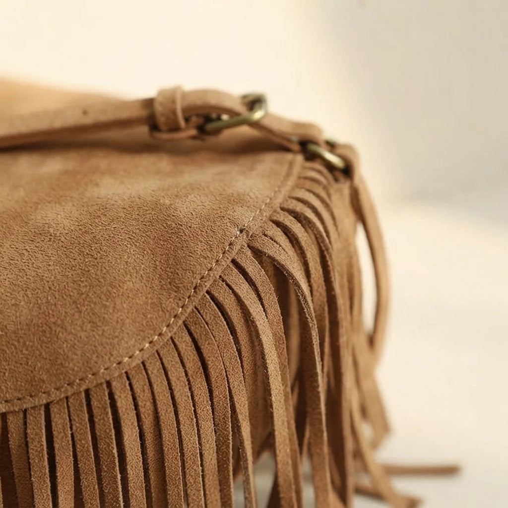 Close-up of fringe stitching and texture on Light Brown tan fringe crossbody bag
