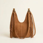 Back panel of Brown tan fringe hobo bag with strap attachments