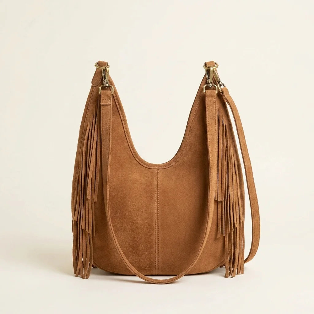 Back panel of Brown tan fringe hobo bag with strap attachments