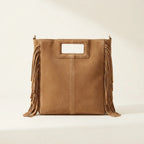 Camel tan fringe shoulder bag, front view