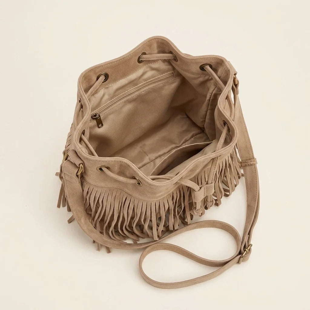 Interior lining and pockets of Khaki tan suede fringe bucket bag
