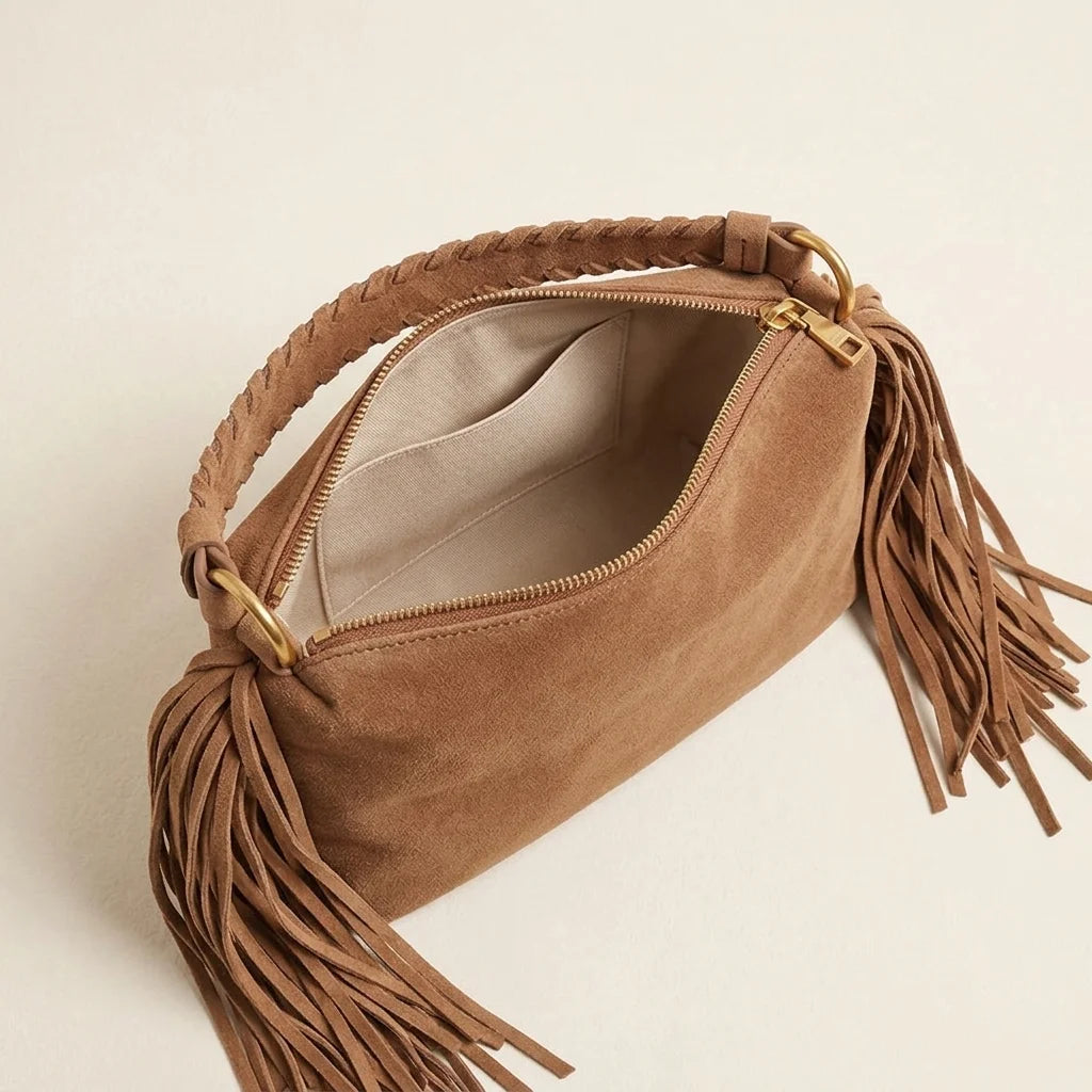 Interior lining and pockets of Brown tan suede fringe clutch bag