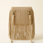 Back panel of Beige tassel fringe clutch bag with strap attachments