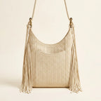 Back panel of Beige tassel fringe hobo bag with strap attachments