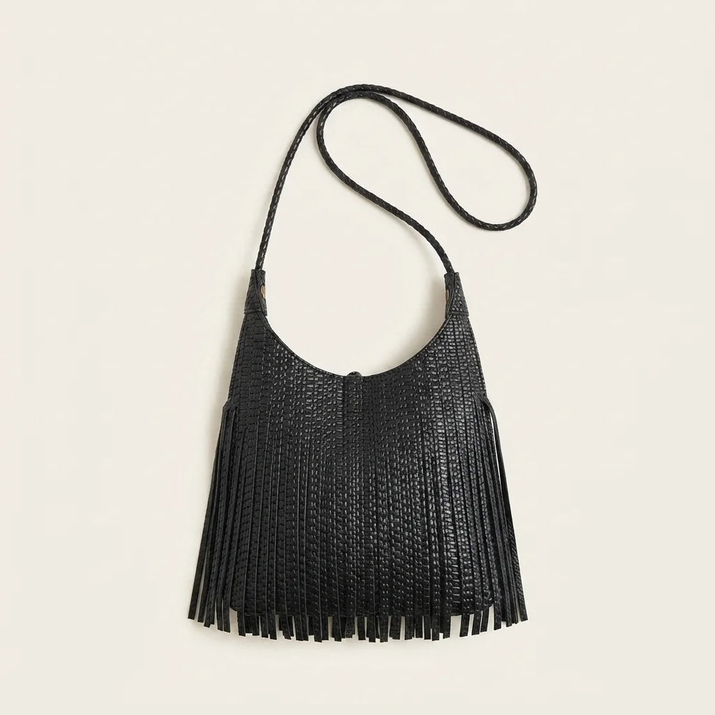 Back panel of Black tassel fringe hobo bag with strap attachments