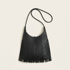 Back panel of Black tassel fringe hobo bag with strap attachments