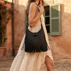 Woman wearing Black tassel fringe hobo bag with swaying fringe