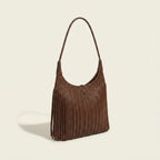 Coffee tassel fringe hobo bag, three-quarter angle showing side depth