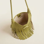 Interior lining and pockets of Green tassel fringe hobo bag