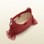 Interior lining and pockets of Red tassel fringe hobo bag