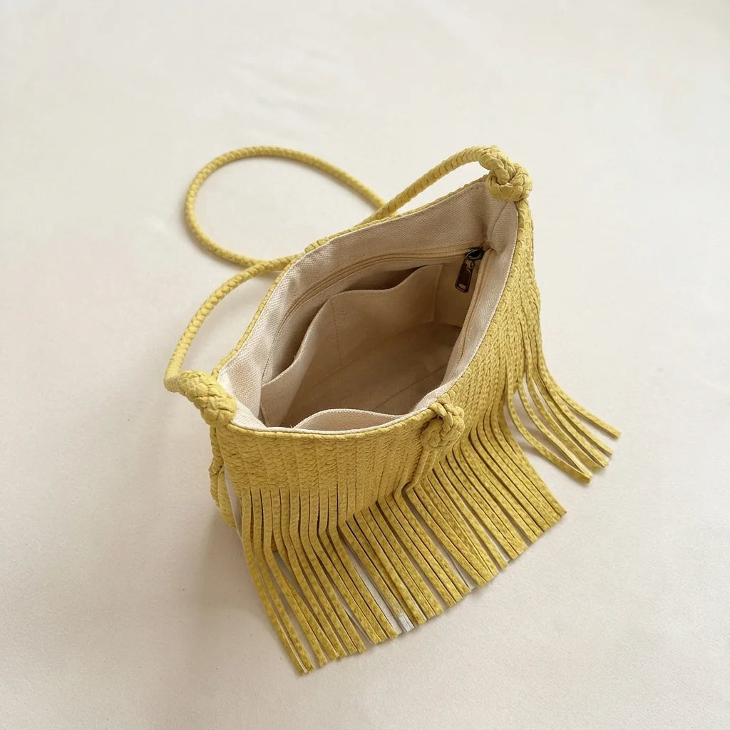 Interior lining and pockets of Yellow tassel fringe hobo bag