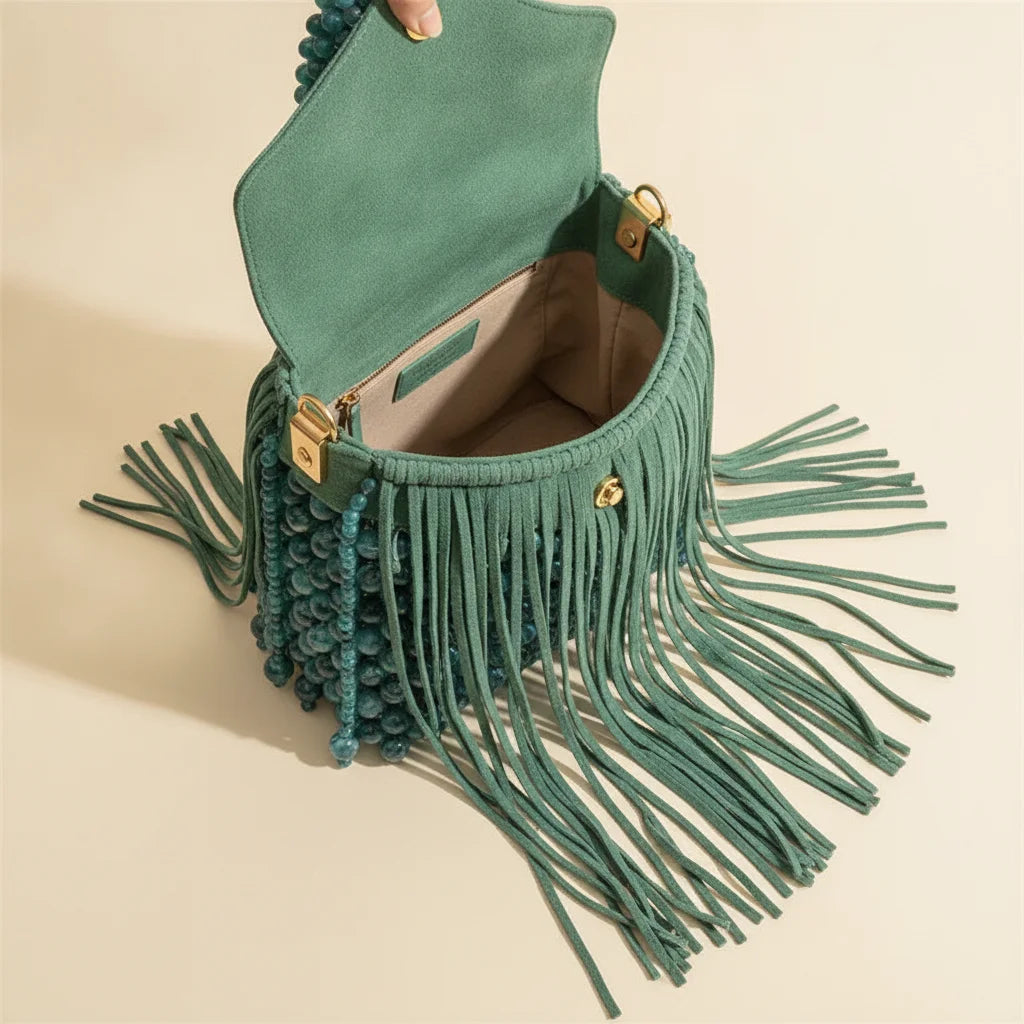 Interior lining and pockets of Green turquoise fringe bag