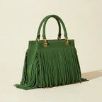 Green turquoise fringe bag, three-quarter angle showing side depth