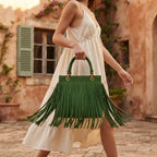 Woman wearing Green turquoise fringe bag with swaying fringe