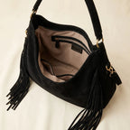 Interior lining and pockets of Black vegan fringe hobo bag