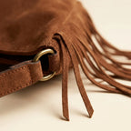 Close-up of fringe stitching and texture on Brown vegan fringe hobo bag