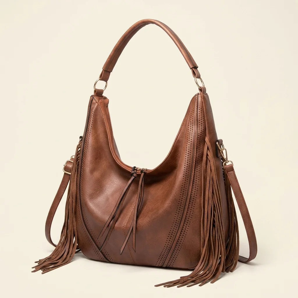 Brown vegan fringe hobo bag, three-quarter angle showing side depth