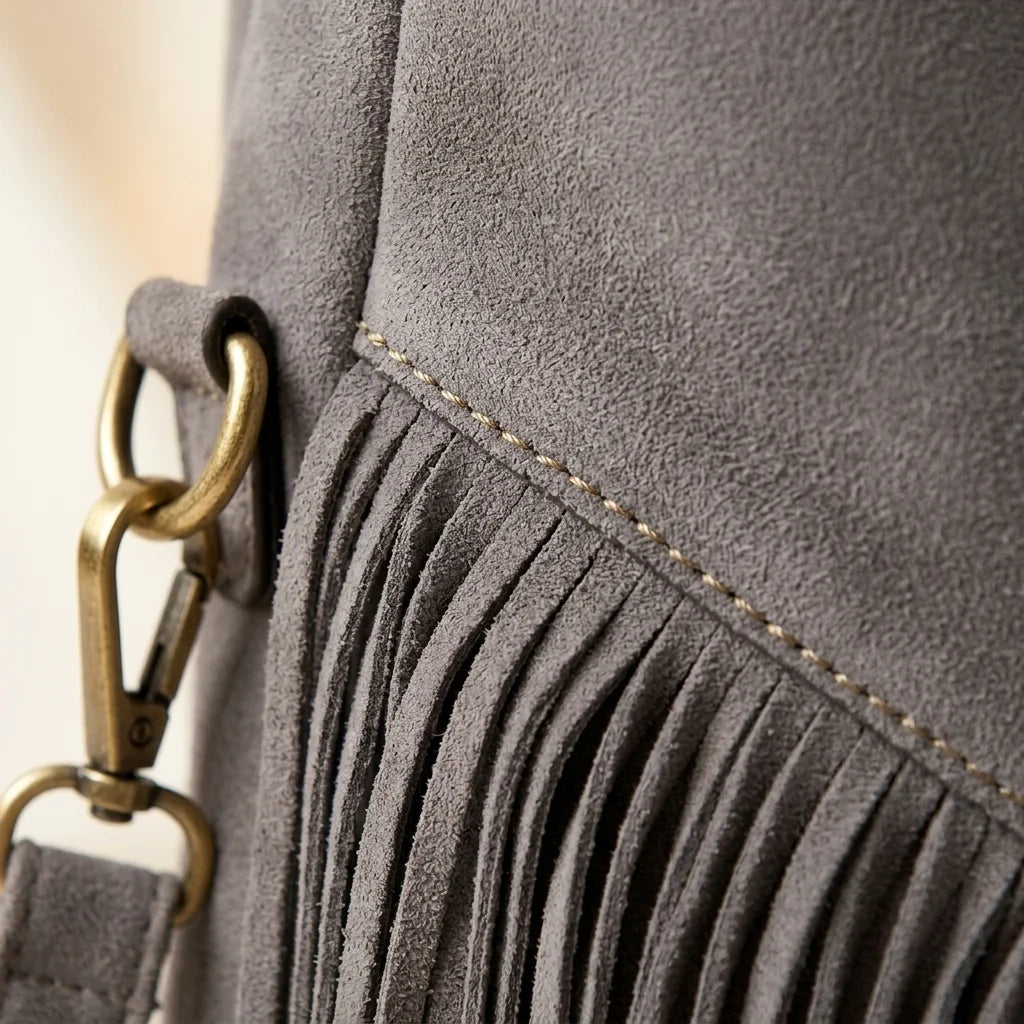 Close-up of fringe stitching and texture on Grey vegan fringe hobo bag