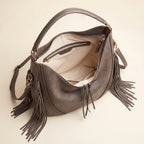 Interior lining and pockets of Grey vegan fringe hobo bag