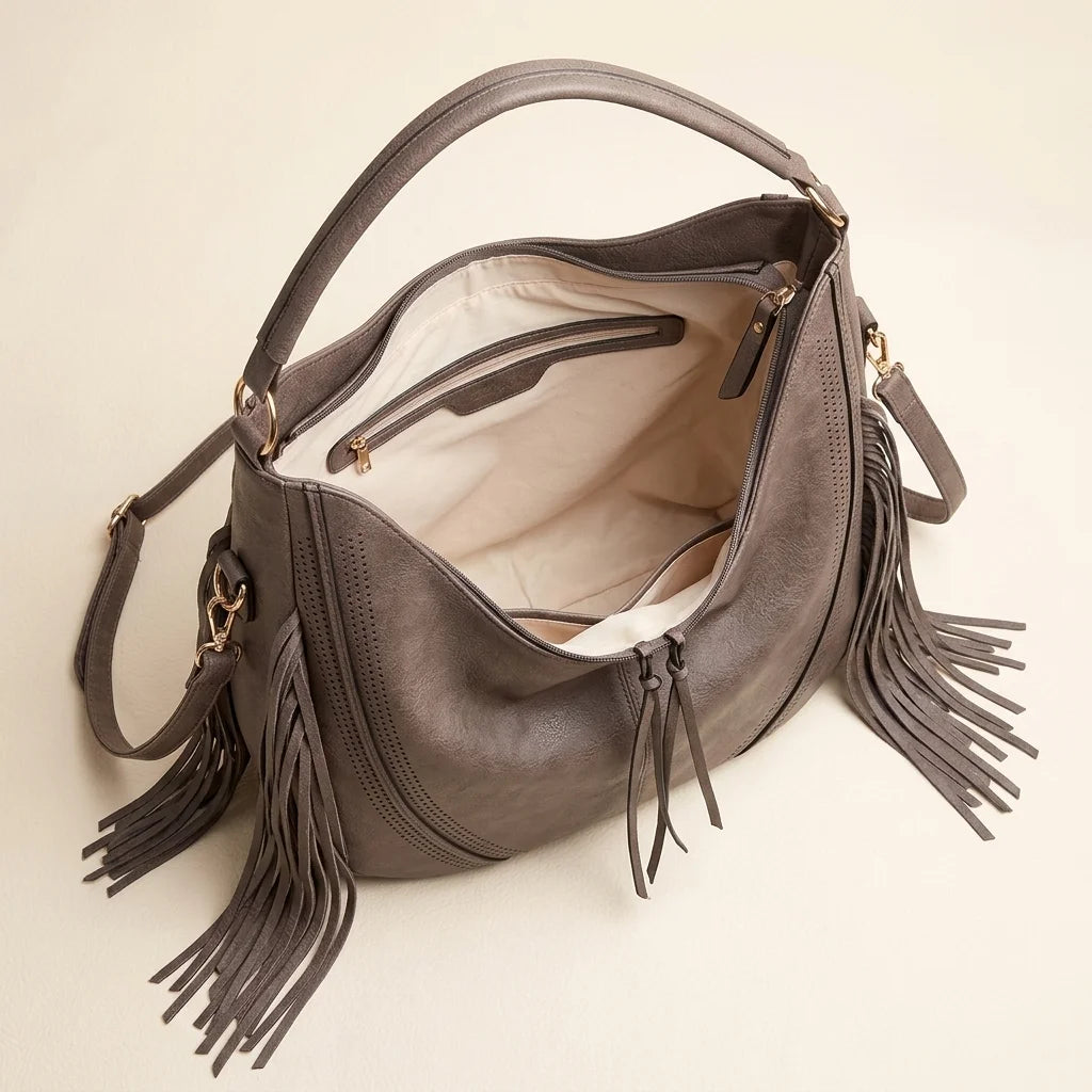 Interior lining and pockets of Grey vegan fringe hobo bag
