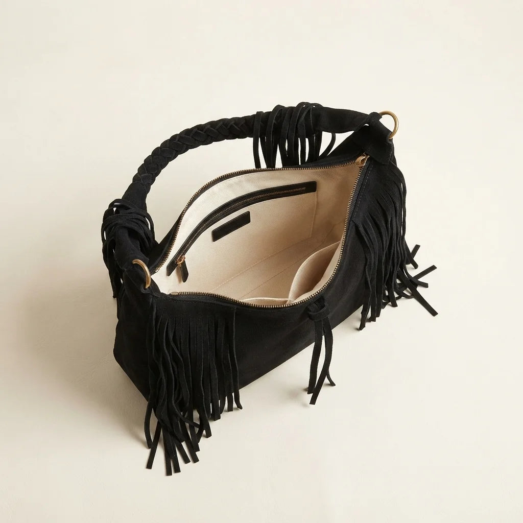 Interior lining and pockets of Black vintage boho fringe bag