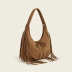 Brown vintage boho fringe bag, three-quarter angle showing side depth