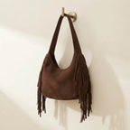 Coffee vintage boho fringe bag, three-quarter angle showing side depth