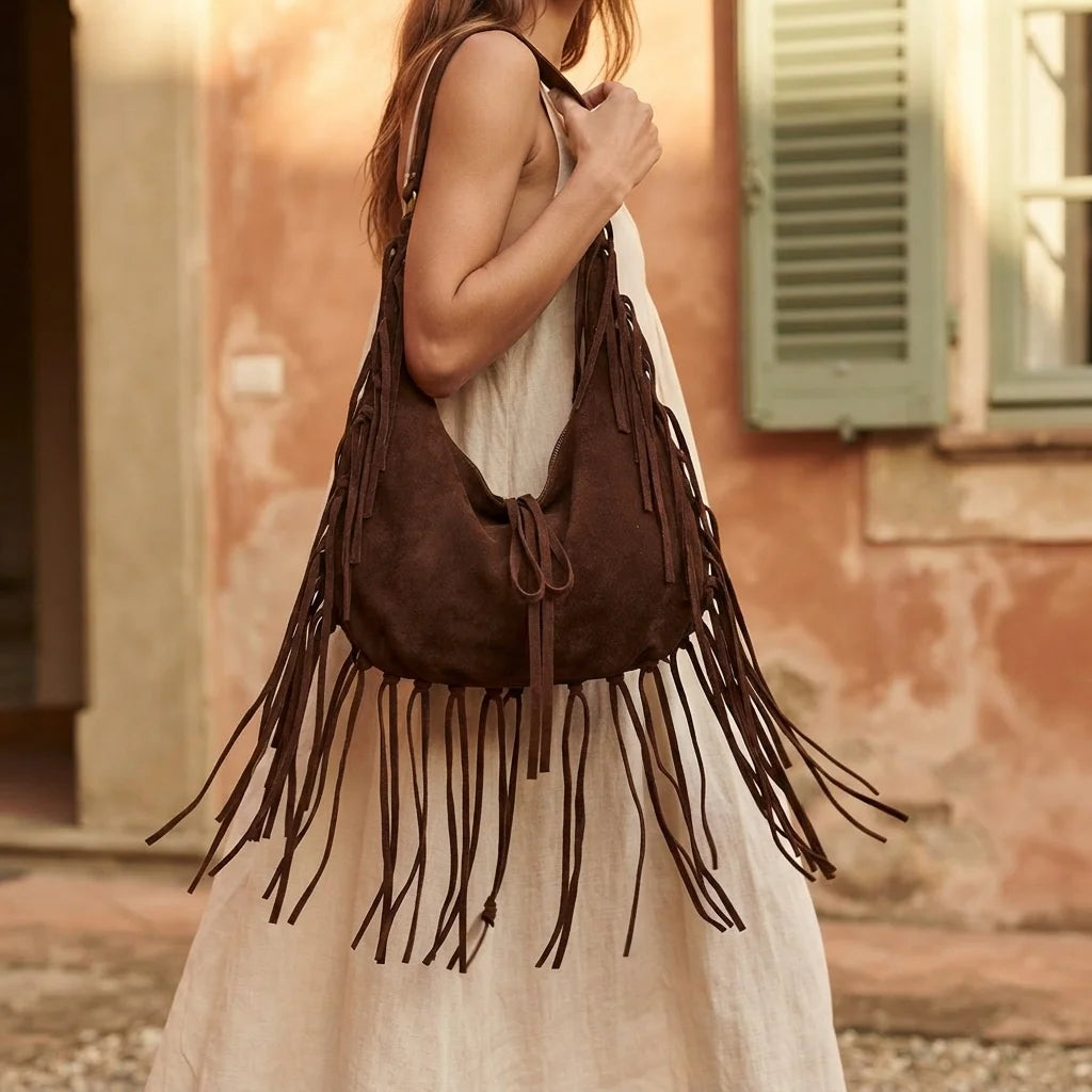 Woman wearing Coffee vintage boho fringe bag with swaying fringe