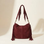Back panel of Red vintage boho fringe bag with strap attachments