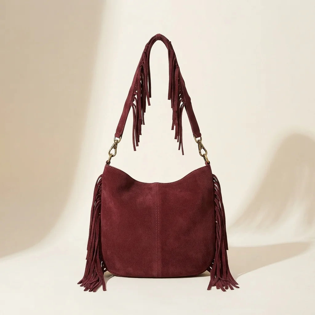 Back panel of Red vintage boho fringe bag with strap attachments