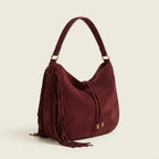 Red vintage boho fringe bag, three-quarter angle showing side depth