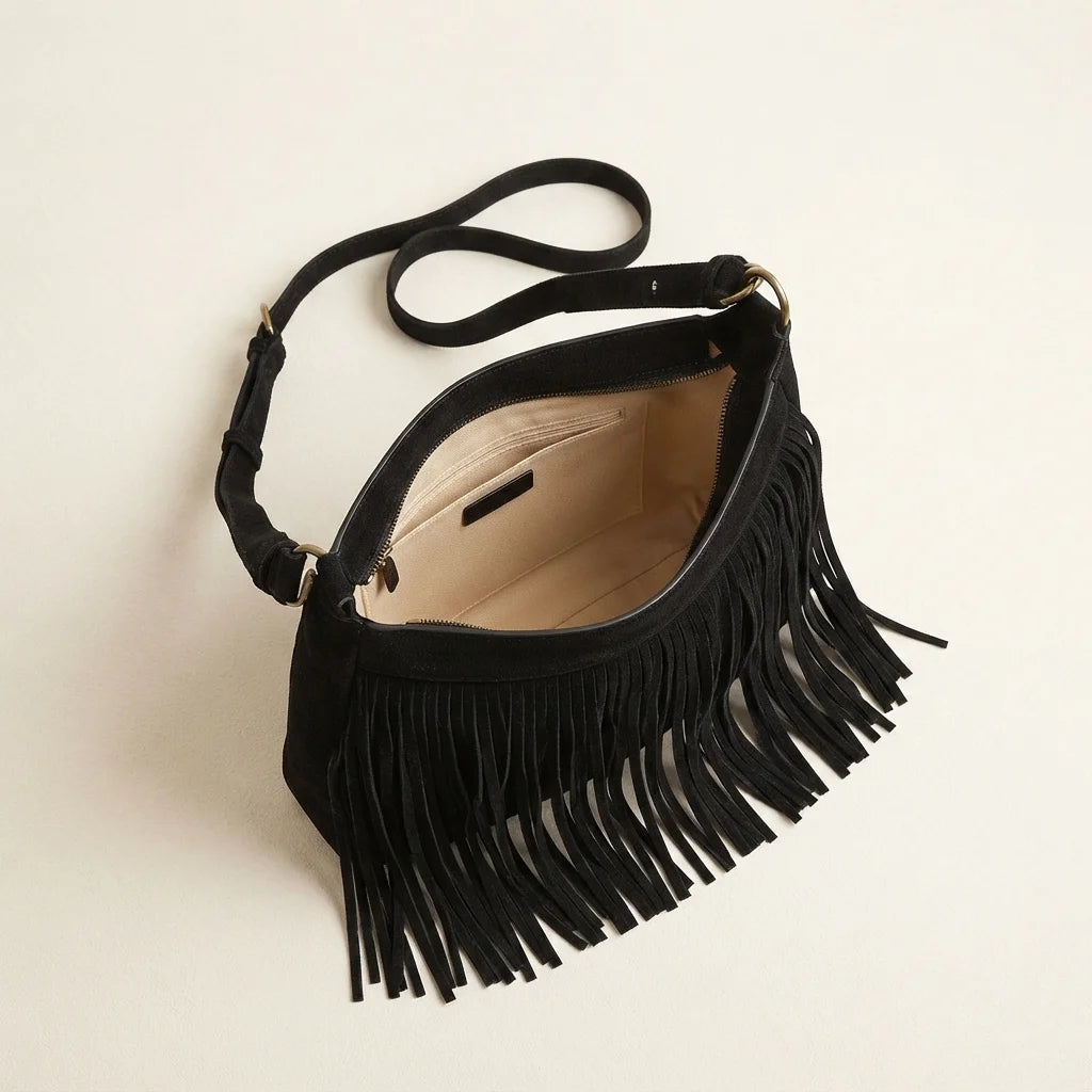 Interior lining and pockets of Black vintage fringe hobo bag