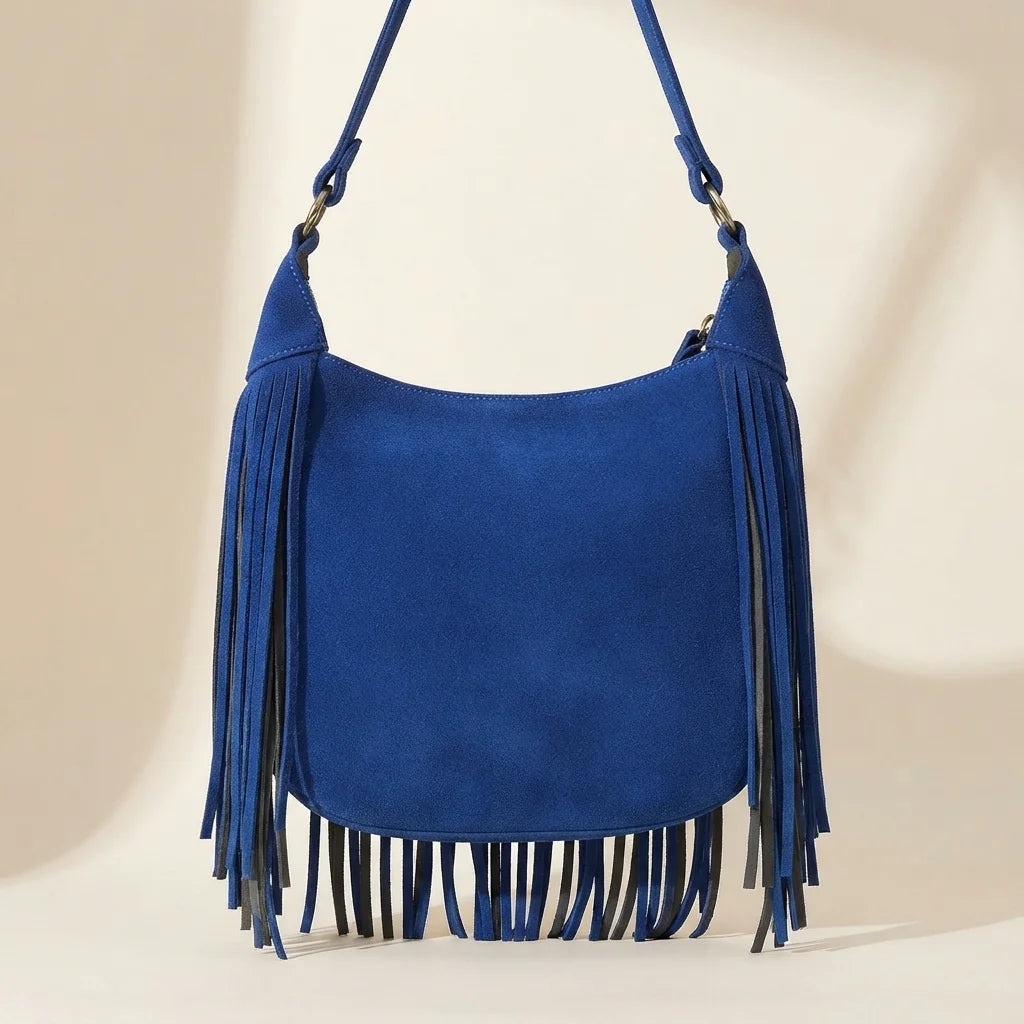 Back panel of Blue vintage fringe hobo bag with strap attachments