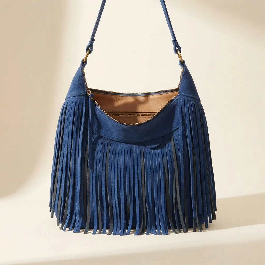 Blue vintage fringe hobo bag, front view