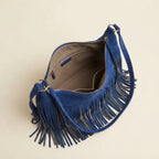 Interior lining and pockets of Blue vintage fringe hobo bag
