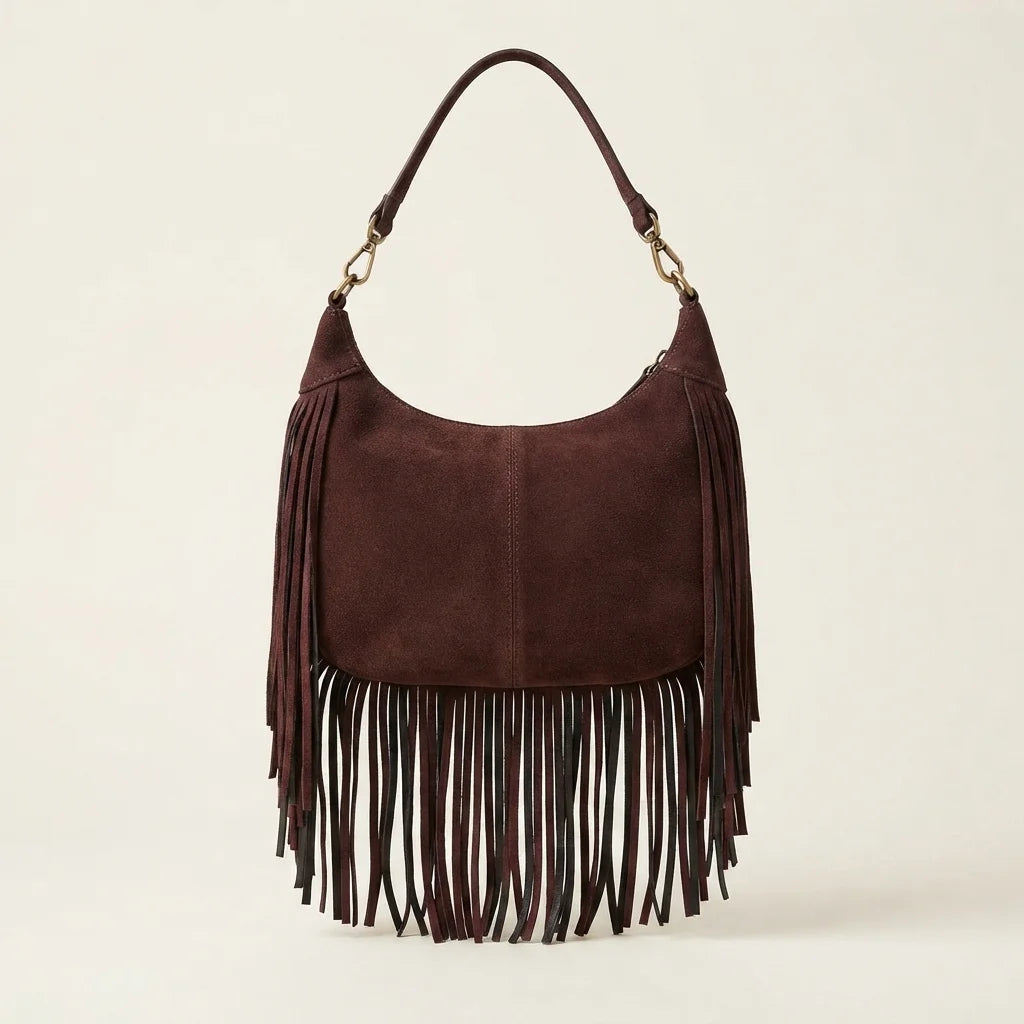 Back panel of Brown vintage fringe hobo bag with strap attachments