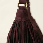 Close-up of fringe stitching and texture on Brown vintage fringe hobo bag