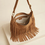 Interior lining and pockets of Light Brown vintage fringe hobo bag