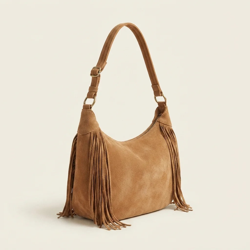 Light Brown vintage fringe hobo bag, three-quarter angle showing side depth