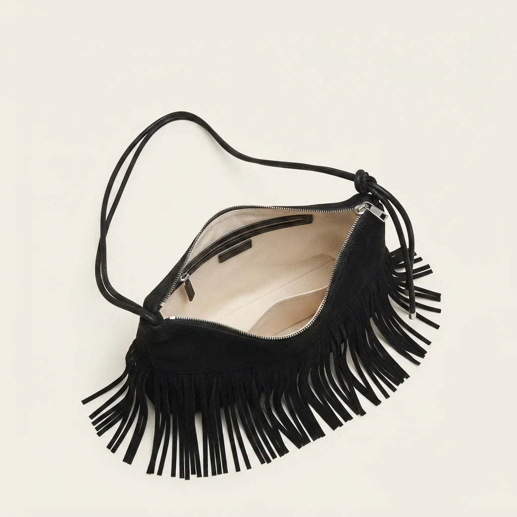 Interior lining and pockets of Black vintage suede fringe bag