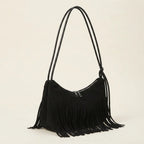 Black vintage suede fringe bag, three-quarter angle showing side depth