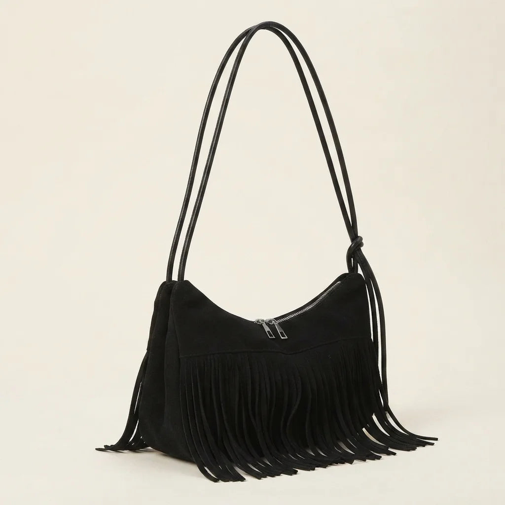 Black vintage suede fringe bag, three-quarter angle showing side depth