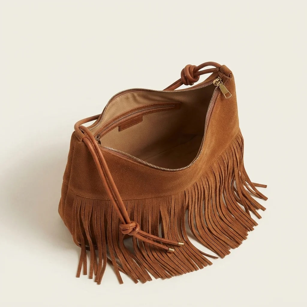 Interior lining and pockets of Brown vintage suede fringe bag