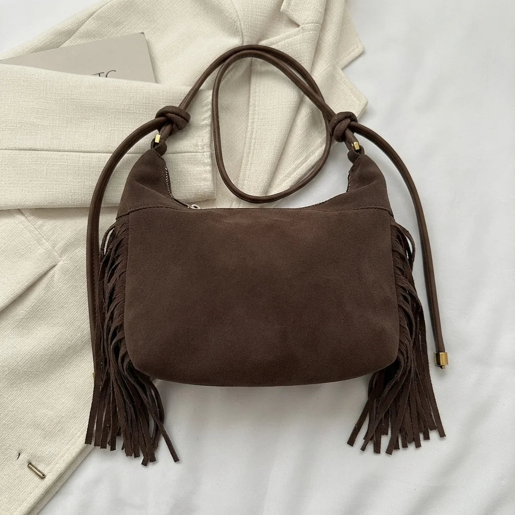 Back panel of Coffee vintage suede fringe bag with strap attachments