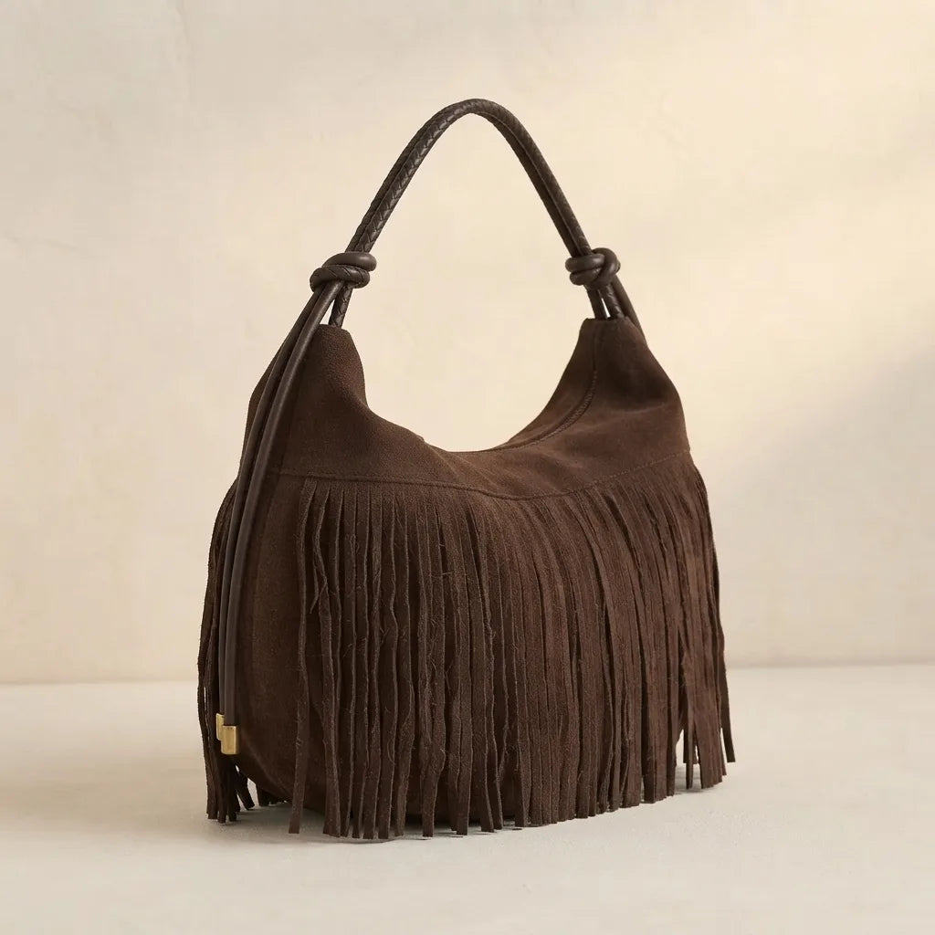 Coffee vintage suede fringe bag, three-quarter angle showing side depth
