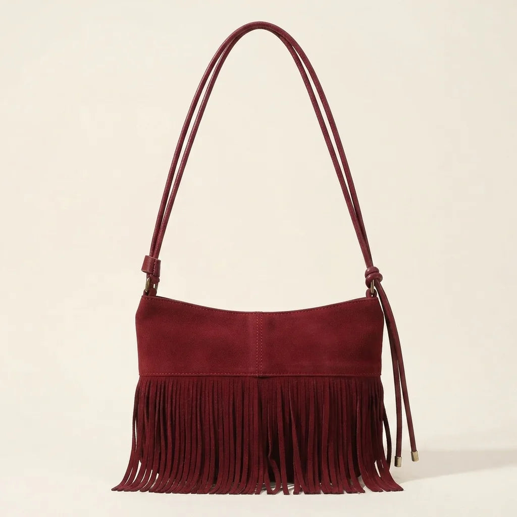 Back panel of Red vintage suede fringe bag with strap attachments