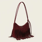 Red vintage suede fringe bag, three-quarter angle showing side depth